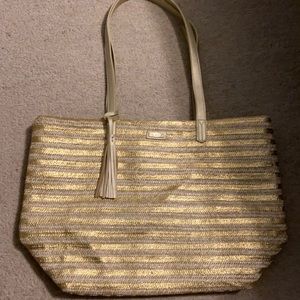 Awesome straw tote bag with gold accent color.